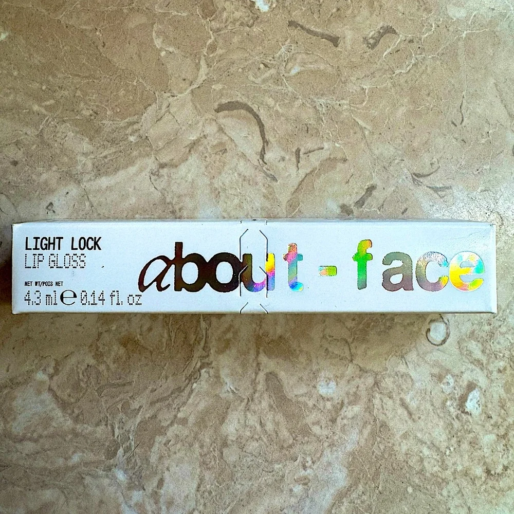 about-face Light Lock Lip Gloss - Angel On Fire (iced mauve)